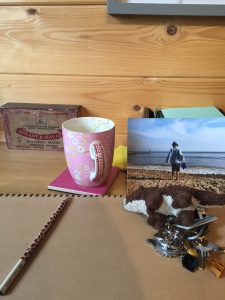 Cup, pencil, sketchbook, photo, keys